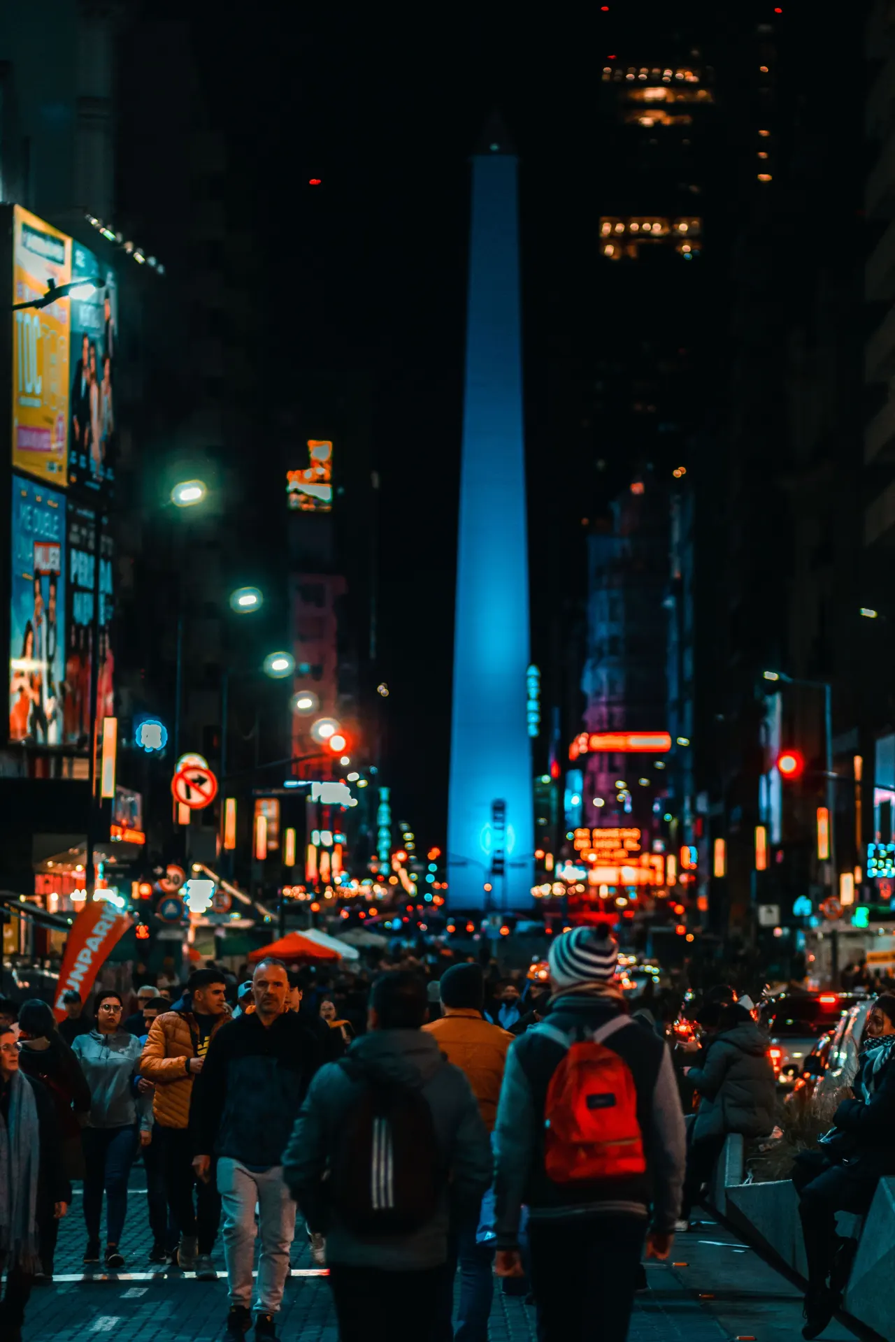 People walking in Buenos Aires at night for a capybara Argentina World Cup team guide