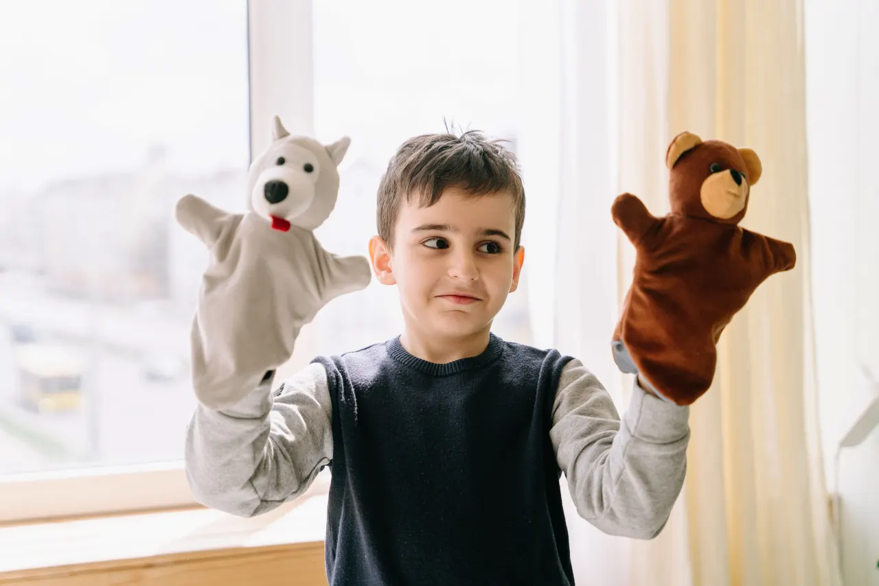 Child with toys as a reminder that back-to-school routines work better when kids get simple systems