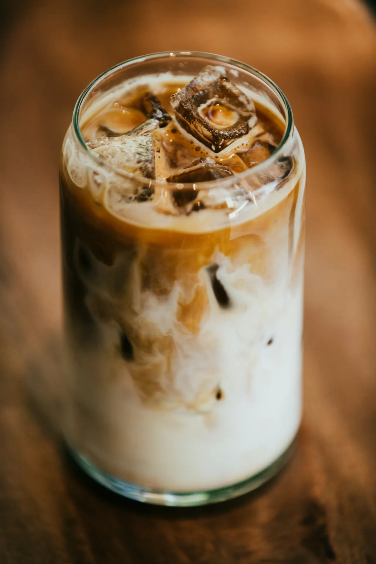 An iced drink on a cafe counter.